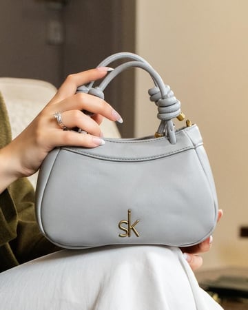 شنطة لون رصاصي حجم صغير