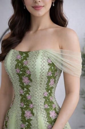 فستان سهرة أخضر فاتح تل مطرز ورود
