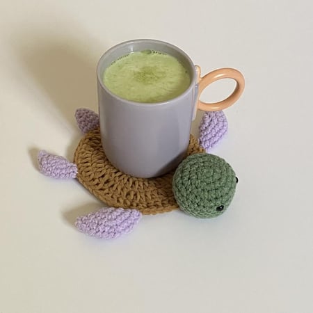 قاعدة اكواب على شكل سلحفاة