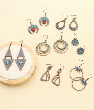 حلق لون نحاسي ( 7 مجموعات )