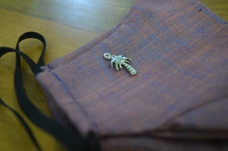 اضافة اكسسوار معدني للكمامة