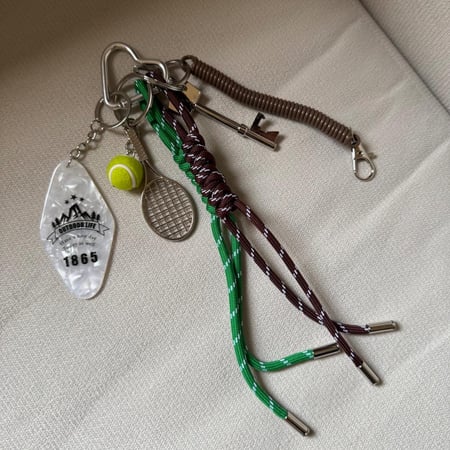 ميدالية ميو ميو Miumiu-charm - متجر ذا ترند