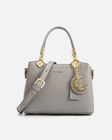 شنطة نسائية باللون الرمادي