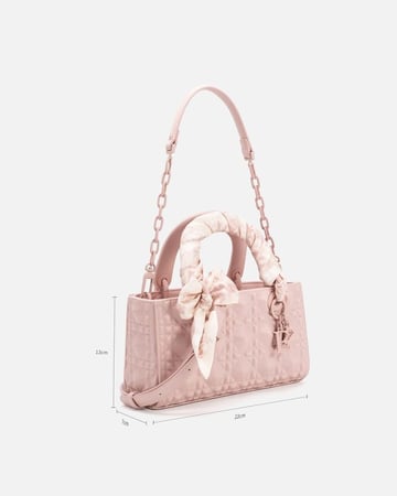 شنطة نسائية بجلد بارز بلون وردي