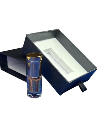 كحل الاثمد الاصفهاني الاحمر ربع تولة مع مكحلة نحاس ايرانية صغيرة - متج