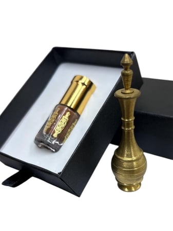 كحل الاثمد الاصفهاني الاحمر ربع تولة مع مكحلة نحاس ايرانية صغيرة - متج