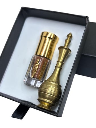 كحل الاثمد الاصفهاني الاحمر ربع تولة مع مكحلة نحاس ايرانية صغيرة - متج