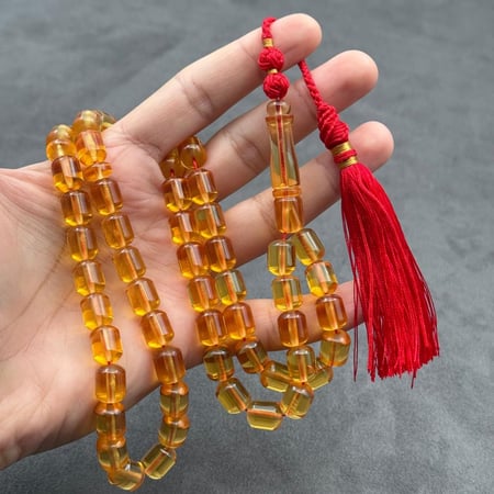 سبحة مستكة شبيه الكهرمان الشفاف