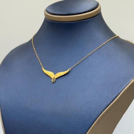 عقد جناح الصقر ذهب عيار 21