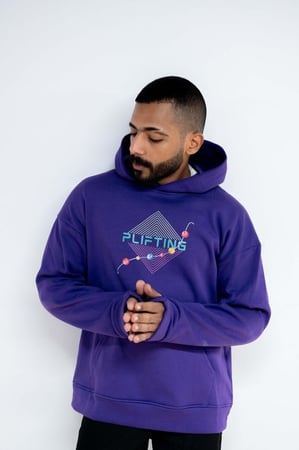 هودي بقصة واسعة وبقبعة لون بنفسجي للجنسين