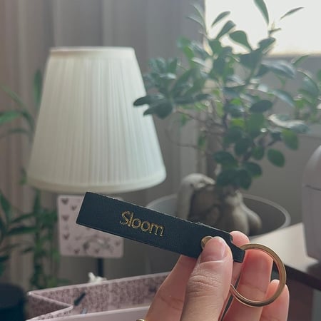 ميدالية مفاتيح حلقه ذهبية