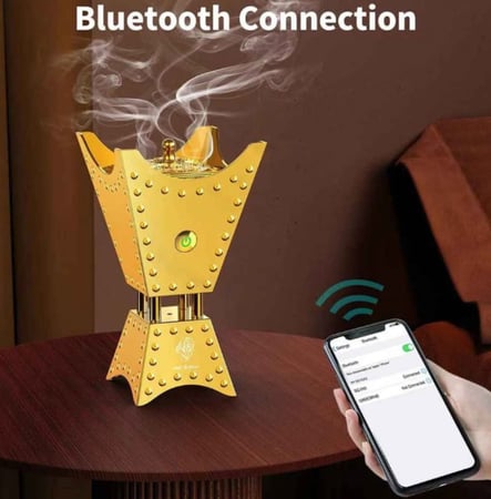 مبخرة العود المعدنية الكهربائية  مع مكبر صوت  من بخور