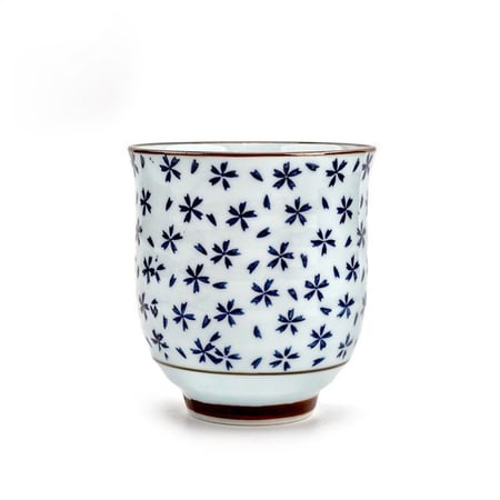 كوب فخاري برسومات ورد أزرق بقاعدة