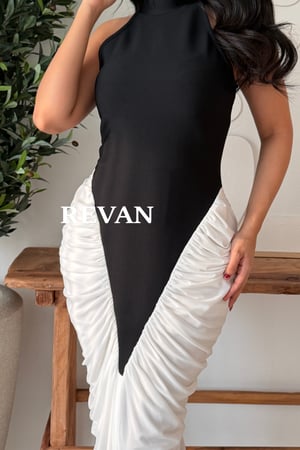 فستان سهرة بتصميم مميز من ريڤــان