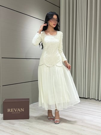 فستان عيد ميدي أنيق بتطريز ناعم وأكمام طويلة من ريڤــان