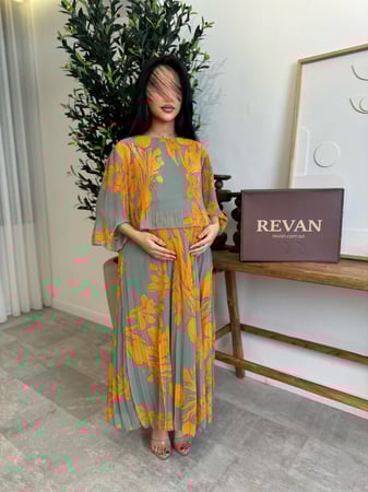 فستان عيد مورد أناقة عصرية من ريڤــان