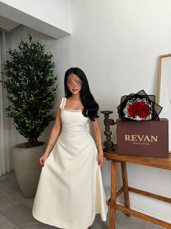 فستان عيد ميدي بفيونكة خلفية من ريڤــان