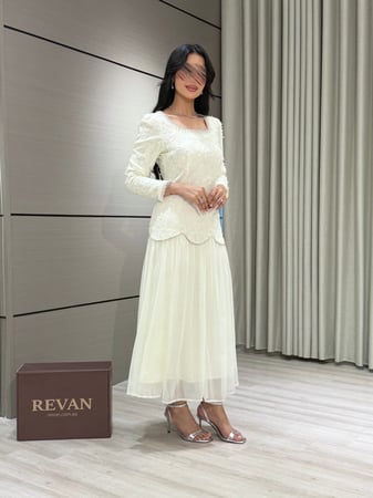 فستان عيد ميدي أنيق بتطريز ناعم وأكمام طويلة من ريڤــان