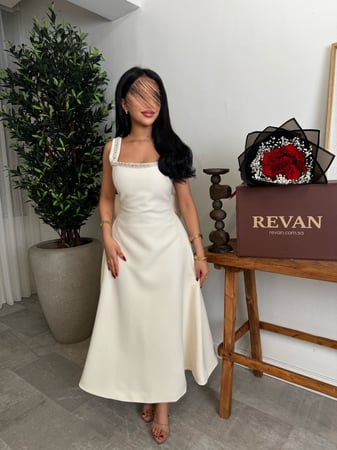 فستان عيد ميدي بفيونكة خلفية من ريڤــان