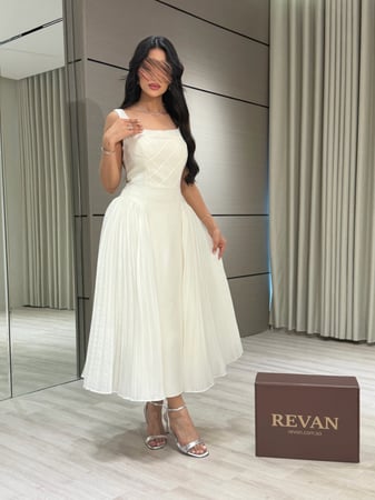 فستان عيد ميدي تصميم أنيق من ريڤــان