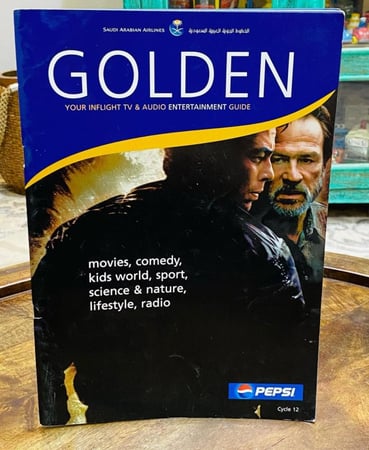 نشرة الخطوط الجوية السعودية بشعار بيبسي (دليل البرامج المرئية والسمعية للترفية) بحالة المطبعة