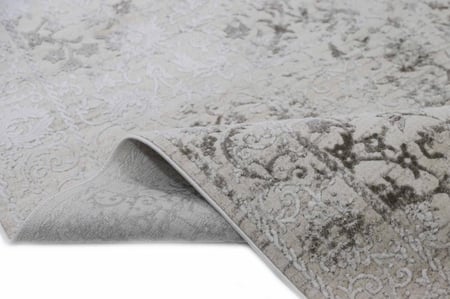 سجادة إليت من روفال بتصميم مودرن يضفي لمسة جمالية أنيقة لون بني-كريمي