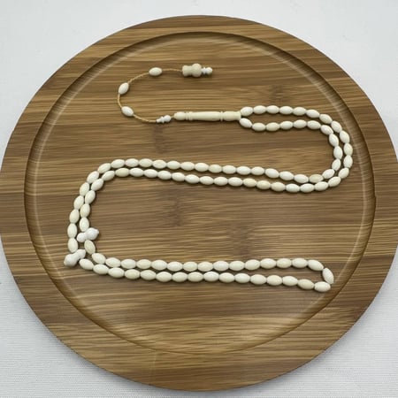 سبحة عظم جمل طبيعي ناعمة (99 خرزة) مع تمليكة حرفية