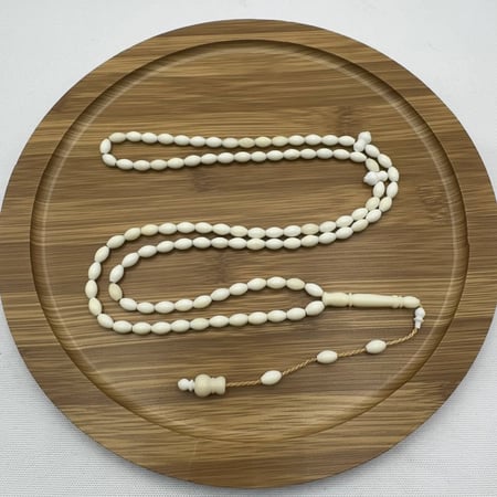 سبحة عظم جمل طبيعي ناعمة (99 خرزة) مع تمليكة حرفية
