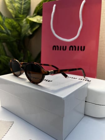 نظارة - MIU MIU اطار تايقر- عدسة بني