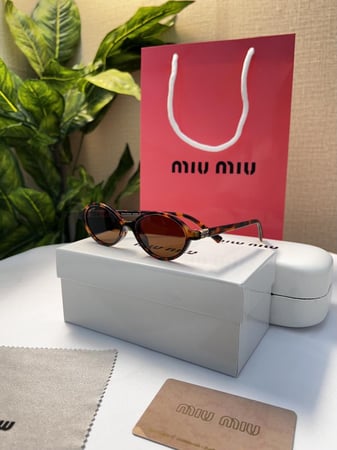 نظارة - MIU MIU اطار تايقر- عدسة بني