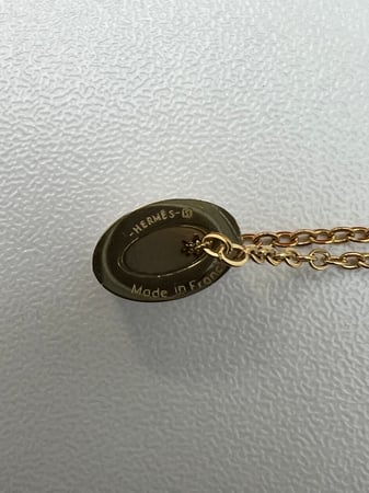 سلسال HERMES صغير معدن ذهبي - وردي