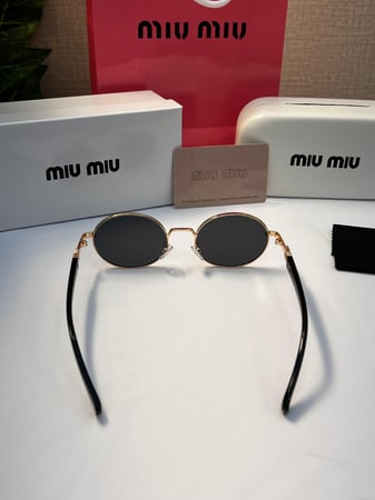 نظارة miu miu إطار أسود - عدسة أسود