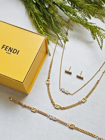 صورة طقم Fendi طقم FENDI معدن ذهبي ماستر كواليتي
