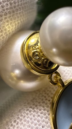 حلق Dior وردي - ازرق