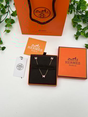 سلسال HERMES صغير معدن ذهبي - وردي