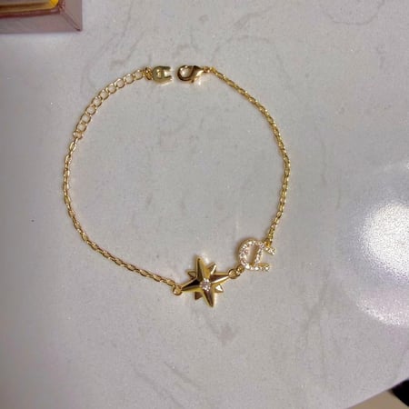 إسوارة AIGNER ذهبي