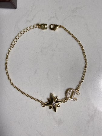 إسوارة AIGNER ذهبي