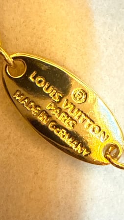 إسوارة LOUIS VUITTON معدن ذهبي - فضي