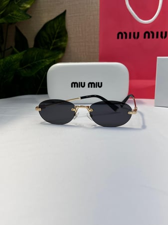 نظارة miu miu أطار ذهبي عدسة أسود