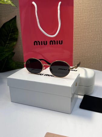 نظارة miu miu إطار أسود - عدسة أسود