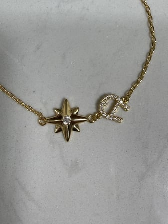 إسوارة AIGNER ذهبي