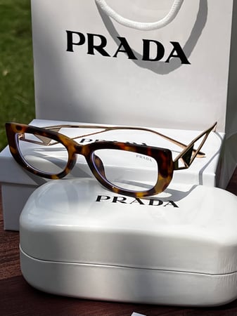 نظارة PRADA تايقر عدسة شفافه