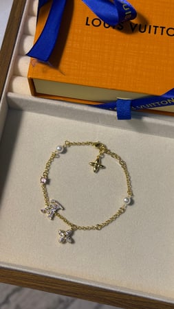 إسوارة LOUIS VUITTON معدن ذهبي