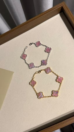 إسوارة Van cleef ذهبي - فيروزي مخطط