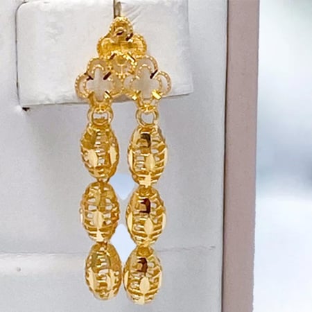 تفاصيل دقيقة لطقم ذهب عيار 21 من عقد الوفاء