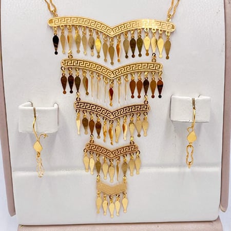 طقم ذهب عيار 21 الوزن 5.3 جرام