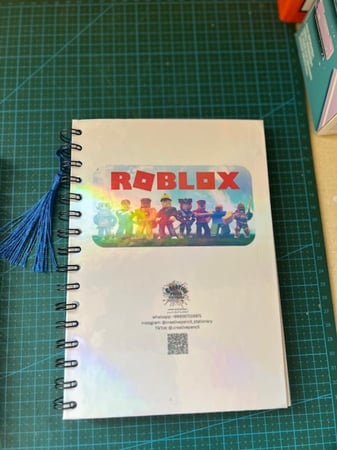 دفتر روبلوكس مع اضافة الاسم