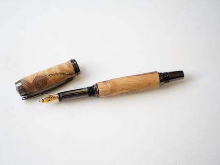 قلم العتم العماني