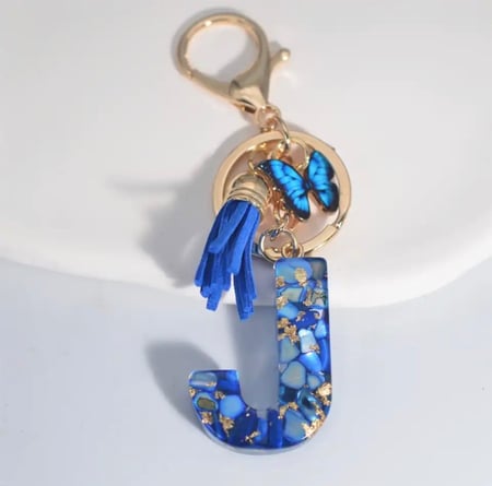Blue Letters Keychains With Butterfly