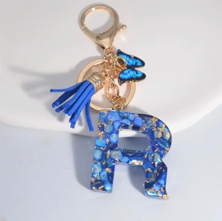 Blue Letters Keychains With Butterfly